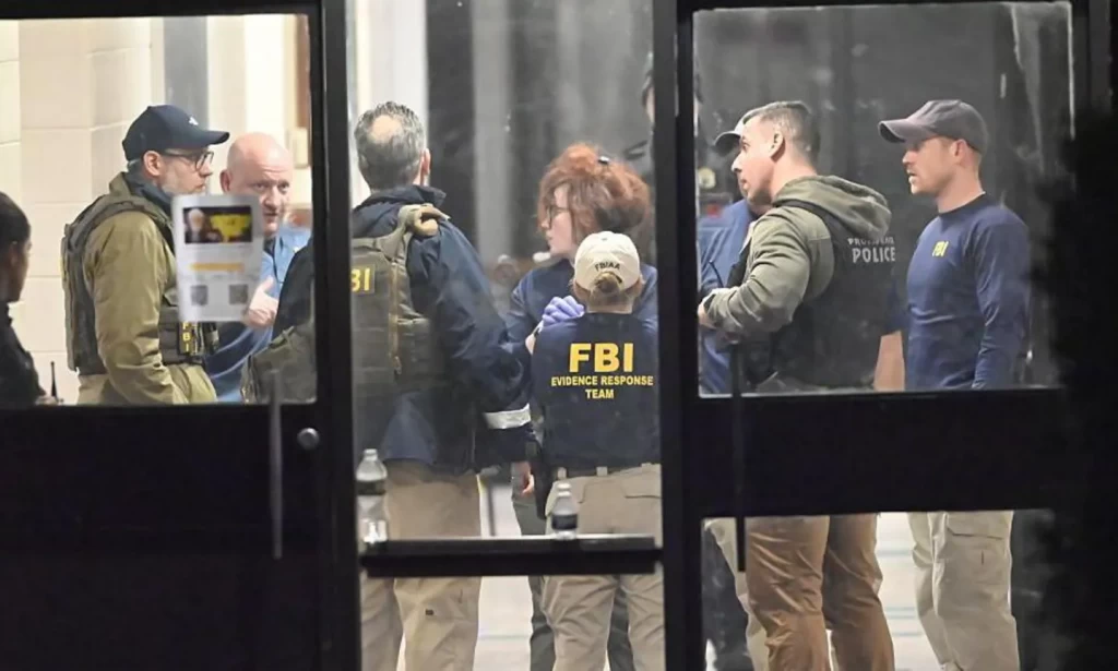 'Person of interest' detained over Brown University shooting, police say