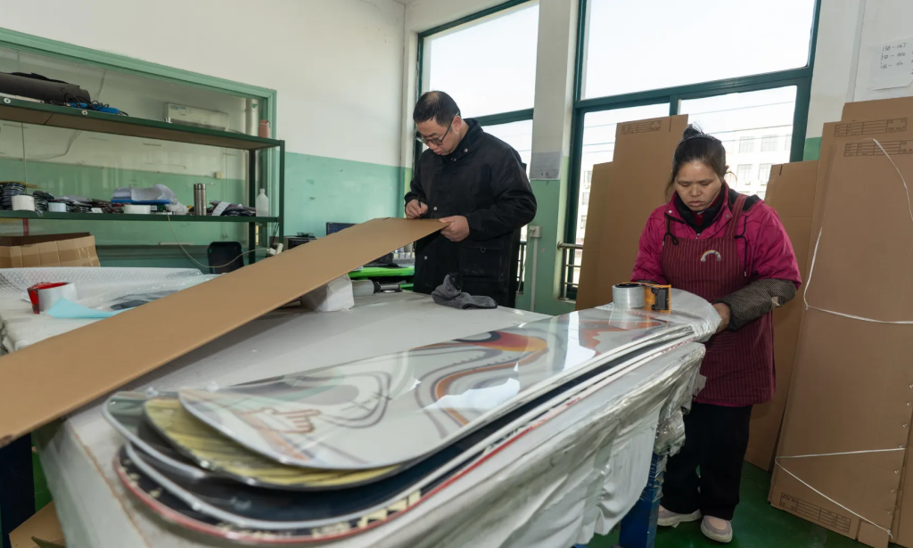 China's industrial profits edge up in 2025, reversing three years of declines as Beijing curbs price wars